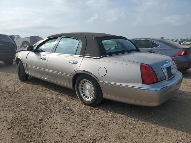Photo 2 from auction – 1999 LINCOLN TOWN CAR E with VIN 1LNHM81W2XY658788
