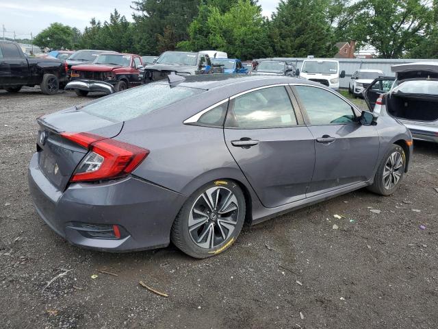 Photo 3 from auction – 2018 HONDA CIVIC EX with VIN 2HGFC1F89JH640839