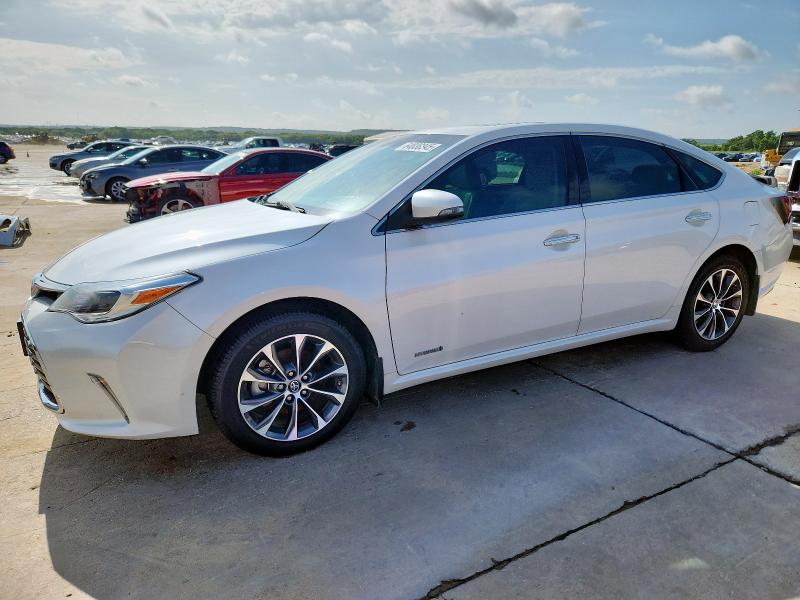TOYOTA AVALON HYB 2016 with VIN 4T1BD1EB8GU053024 - Photo from auction