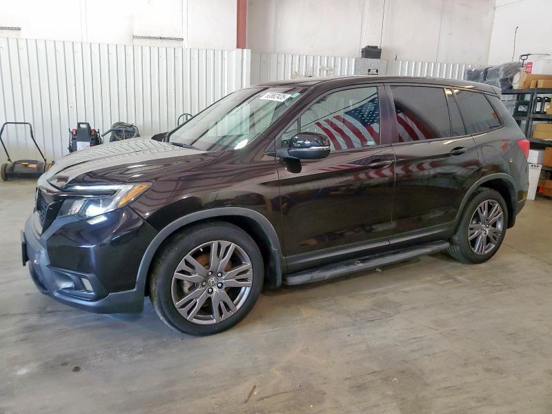HONDA PASSPORT E 2021 with VIN 5FNYF7H52MB000129 - Photo from auction