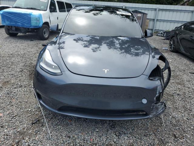Photo 5 from auction – 2022 TESLA MODEL Y with VIN 7SAYGDEF6NF398667
