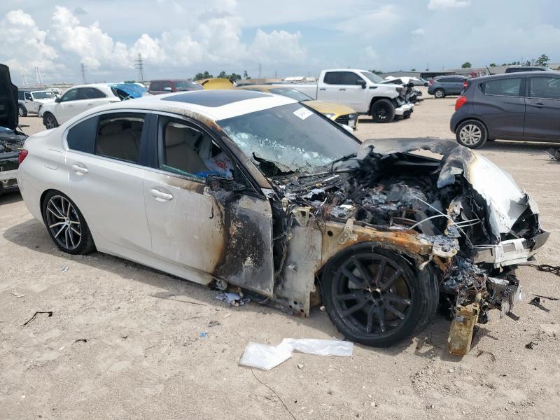 Photo 4 from auction – 2021 BMW 330I with VIN 3MW5R1J00M8C08260