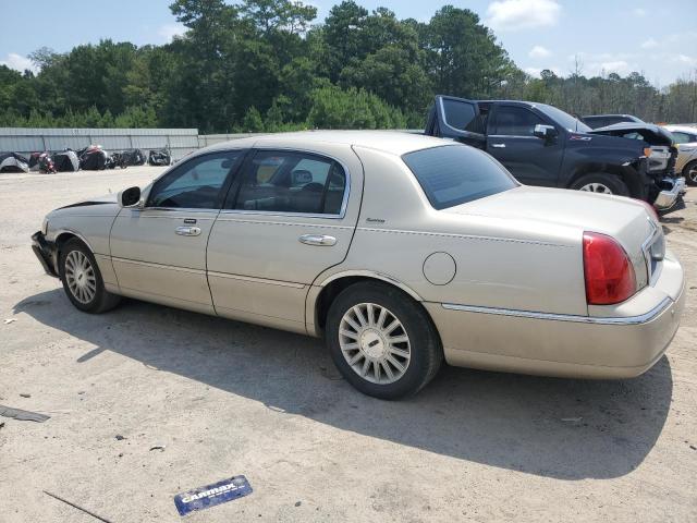 Photo 2 from auction – 2004 LINCOLN TOWN CAR E with VIN 1LNHM81W74Y635499