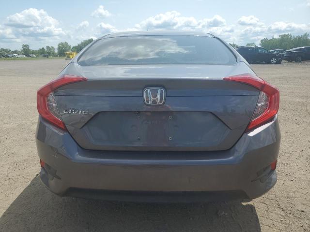Photo 6 from auction – 2018 HONDA CIVIC LX with VIN 2HGFC2F50JH034678