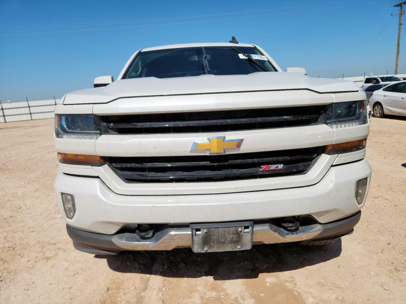 Photo 5 from auction – 2018 CHEVROLET SILVERADO with VIN 3GCUKREC0JG440770