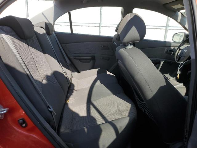 Photo 10 from auction – 2011 KIA RIO BASE with VIN KNADH4A37B6924071