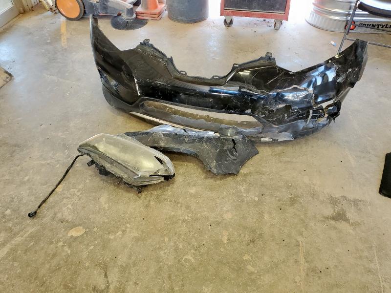 Photo 13 from auction – 2015 NISSAN ROGUE S with VIN KNMAT2MV3FP528547