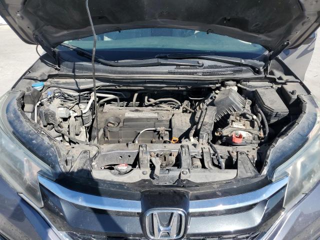 Photo 12 from auction – 2015 HONDA CR-V LX with VIN 5J6RM4H36FL132649