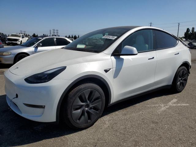 TESLA MODEL Y 2025 with VIN 7SAYGAEE9SF239014 - Photo from auction