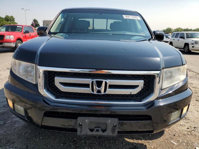 Photo 5 from auction – 2011 HONDA RIDGELINE with VIN 5FPYK1F51BB008223