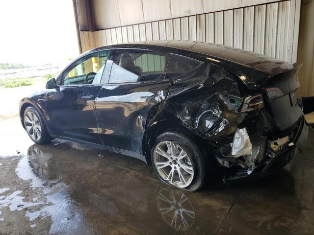 Снимка 2 от търг – 2023 TESLA MODEL Y с VIN 7SAYGDEEXPF683978