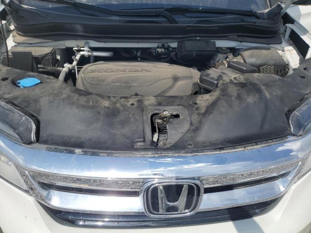 Photo 12 from auction – 2022 HONDA PILOT ELIT with VIN 5FNYF6H00NB054108