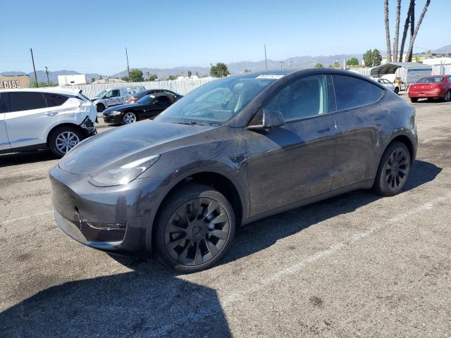 TESLA MODEL Y 2025 with VIN 7SAYGDED5SF321685 - Photo from auction