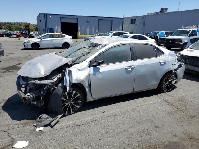 TOYOTA COROLLA L 2017 with VIN 5YFBURHE8HP696822 - Photo from auction