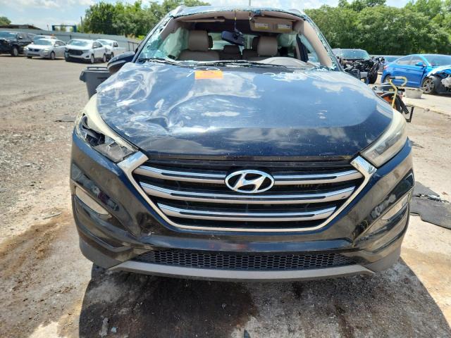 Photo 5 from auction – 2016 HYUNDAI TUCSON LIM with VIN KM8J33A21GU038994