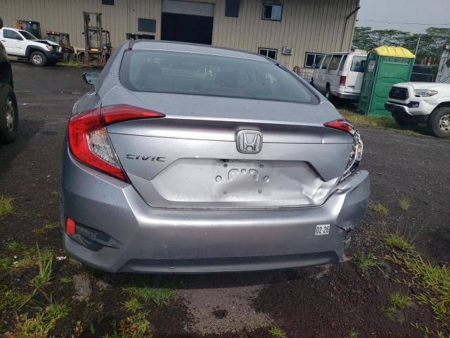Photo 6 from auction – 2018 HONDA CIVIC LX with VIN 19XFC2F59JE011152