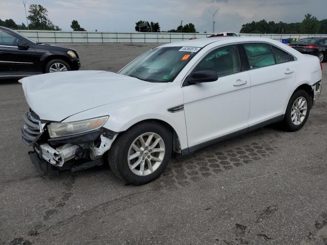 FORD TAURUS SE 2014 with VIN 1FAHP2D81EG143280 - Photo from auction