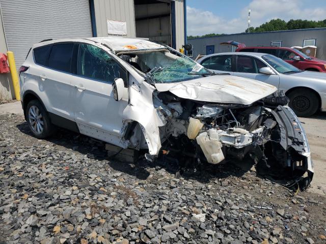 Photo 4 from auction – 2017 FORD ESCAPE TIT with VIN 1FMCU9J90HUD56130