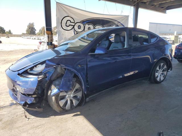 TESLA MODEL Y 2023 with VIN 7SAYGDEE6PF747563 - Photo from auction