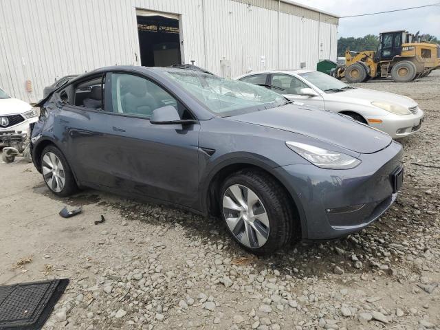 Photo 4 from auction – 2023 TESLA MODEL Y with VIN 7SAYGAEE3PF610028