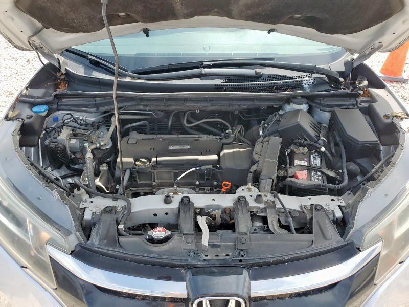 Photo 12 from auction – 2016 HONDA CR-V SE with VIN 2HKRM3H45GH512984