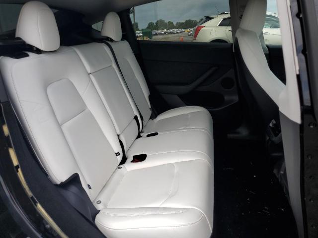 Photo 10 from auction – 2025 TESLA MODEL Y with VIN 7SAYGDED9SF236493