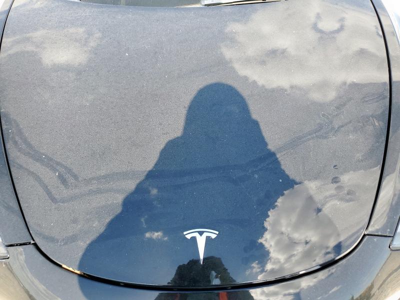 Photo 12 from auction – 2022 TESLA MODEL 3 with VIN 5YJ3E1EB1NF192262