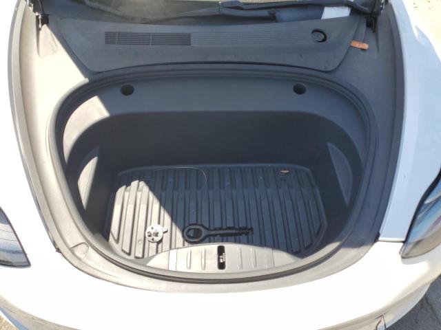 Photo 11 from auction – 2021 TESLA MODEL 3 with VIN 5YJ3E1EB2MF053997