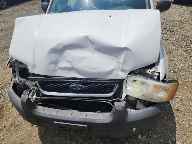 Photo 12 from auction – 2004 FORD ESCAPE XLT with VIN 1FMYU03174DA10319