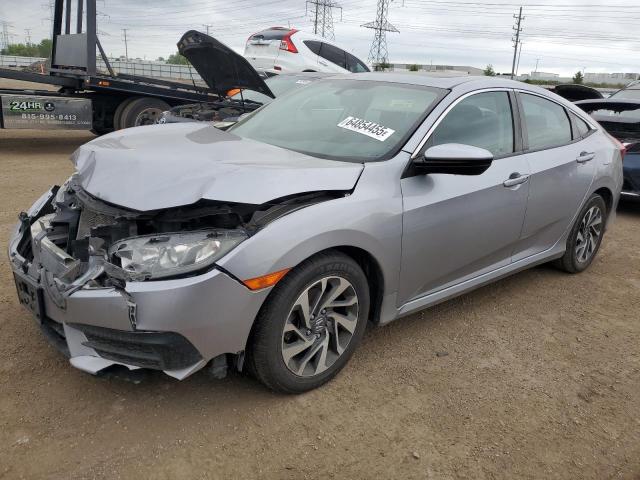 HONDA CIVIC EX 2018 with VIN 19XFC2F78JE035475 - Photo from auction