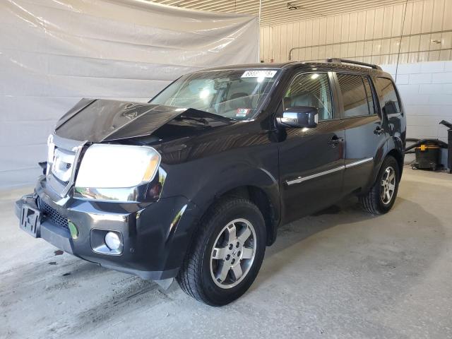 HONDA PILOT TOUR 2010 with VIN 5FNYF4H91AB033815 - Photo from auction