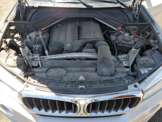 Photo 11 from auction – 2014 BMW X5 XDRIVE3 with VIN 5UXKR0C54E0H22151