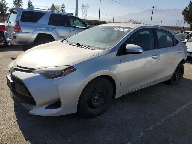 TOYOTA COROLLA L 2019 with VIN 5YFBURHE7KP903899 - Photo from auction