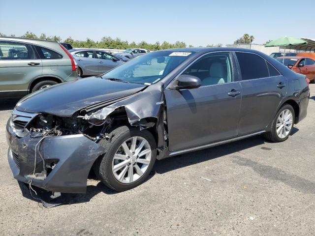 TOYOTA CAMRY HYBR 2012 with VIN 4T1BD1FK2CU043498 - Photo from auction