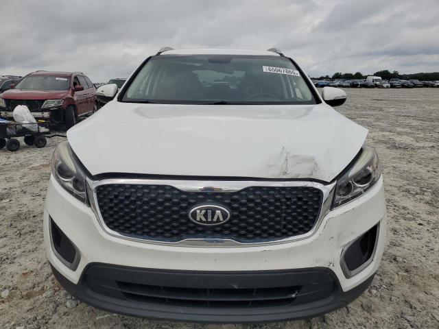 Photo 5 from auction – 2016 KIA SORENTO LX with VIN 5XYPG4A39GG175958