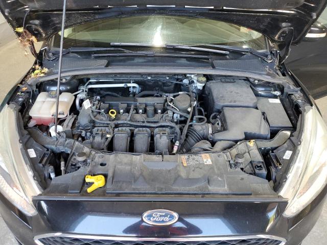 Photo 11 from auction – 2015 FORD FOCUS SE with VIN 1FADP3F28FL267083