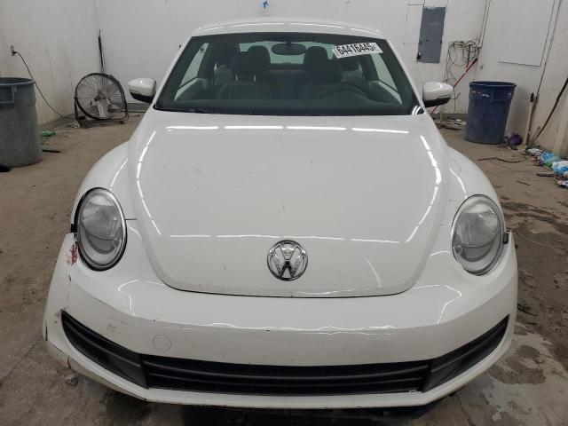 Photo 5 from auction – 2013 VOLKSWAGEN BEETLE with VIN 3VWJX7AT1DM665376