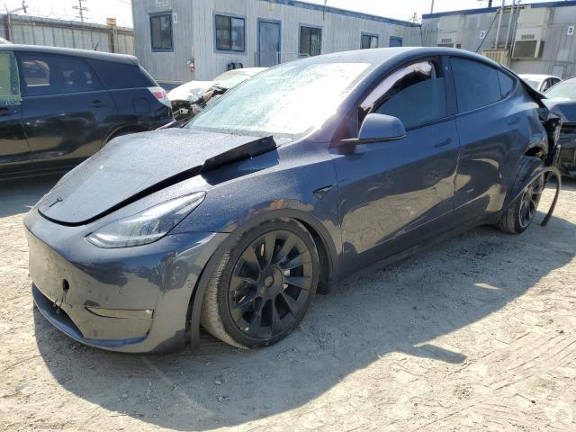 TESLA MODEL Y 2022 with VIN 7SAYGDEE6NF556304 - Photo from auction
