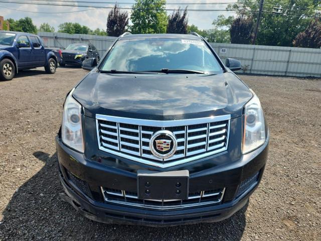 Photo 5 from auction – 2014 CADILLAC SRX LUXURY with VIN 3GYFNEE37ES587755