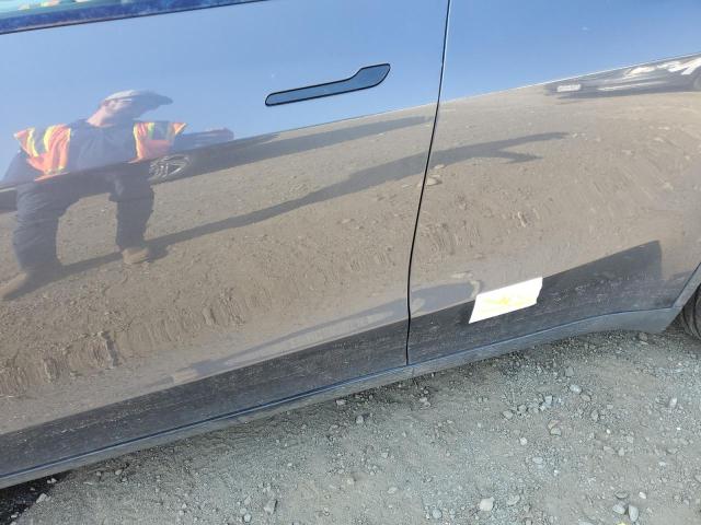 Photo 13 from auction – 2023 TESLA MODEL Y with VIN 7SAYGDEE6PA050410