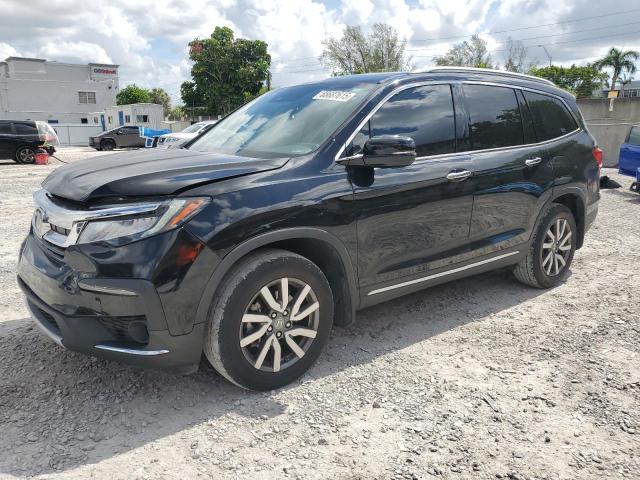 HONDA PILOT TOUR 2022 with VIN 5FNYF5H60NB034388 - Photo from auction