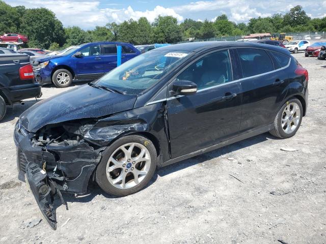 FORD FOCUS TITANIUM 2014 with VIN 1FADP3N20EL161033 - Photo from auction