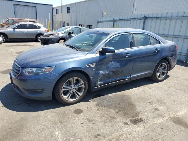 FORD TAURUS SEL 2018 with VIN 1FAHP2E86JG128217 - Photo from auction