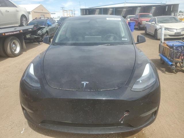 Photo 5 from auction – 2023 TESLA MODEL Y with VIN 7SAYGDEE4PF895002