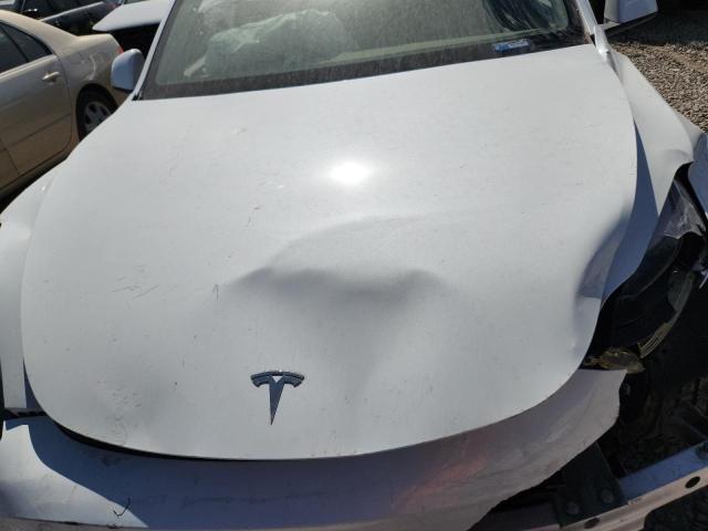Photo 11 from auction – 2024 TESLA MODEL Y with VIN 7SAYGDEF2RF023350