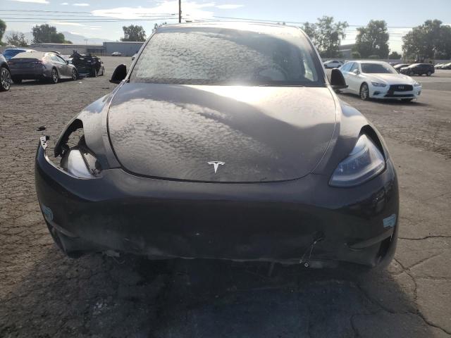 Photo 5 from auction – 2025 TESLA MODEL Y with VIN 7SAYGDED0SF320461