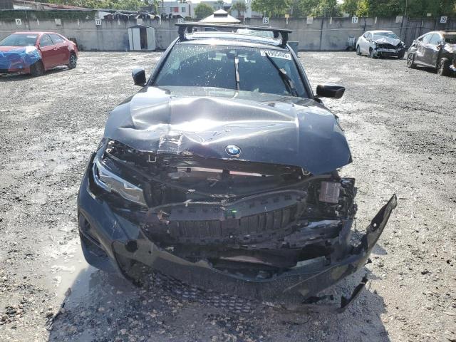 Photo 5 from auction – 2021 BMW 330I with VIN 3MW5R1J08M8B64458