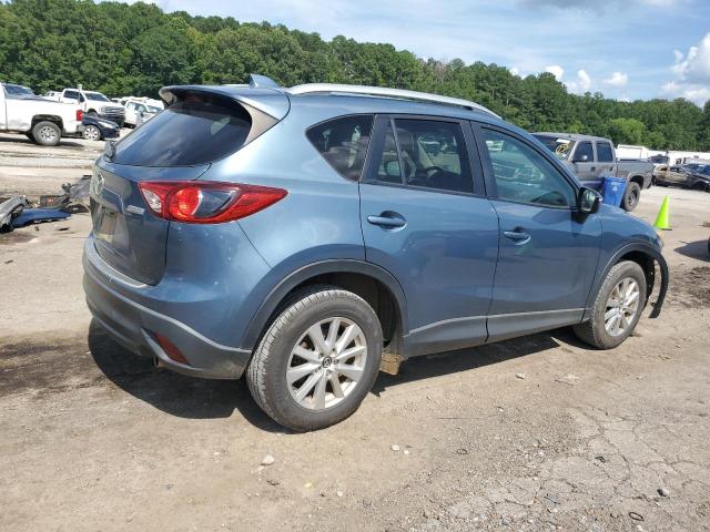 Photo 3 from auction – 2015 MAZDA CX-5 TOURI with VIN JM3KE2CY4F0515171