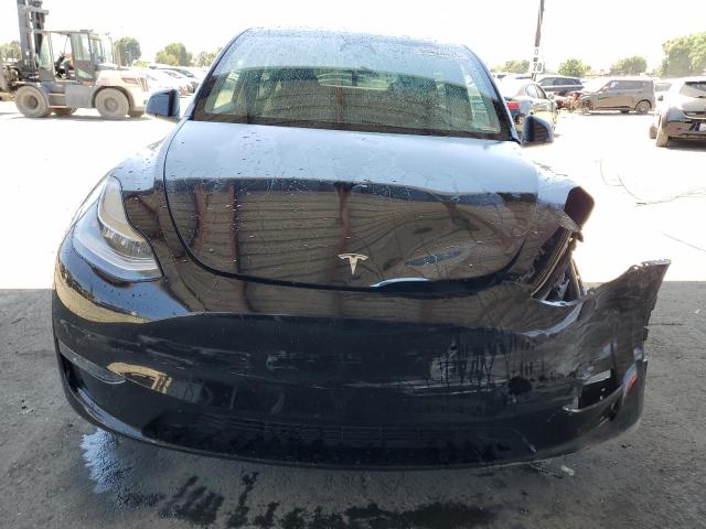 Photo 5 from auction – 2023 TESLA MODEL Y with VIN 7SAYGDEE5PA113948