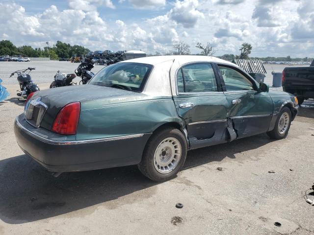 Photo 3 from auction – 2000 LINCOLN TOWN CAR E with VIN 1LNHM81W3YY778794